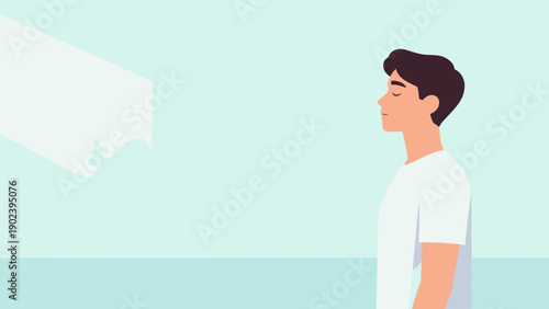 A man is walking in front of a wall with a window. He is looking at the wall and seems to be in a contemplative mood