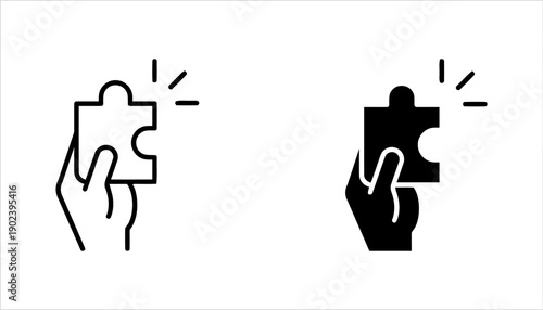Hand holding puzzle piece, idea or solution symbol, abstract