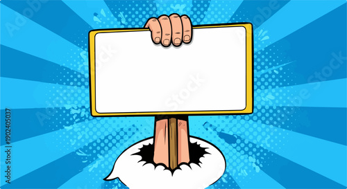 Pop art hand holding blank yellow sign on vibrant blue radial background.
