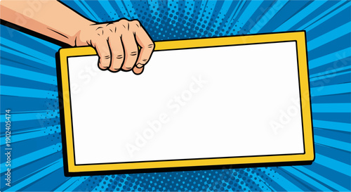 Vibrant pop art hand holds blank frame against a dynamic blue background.