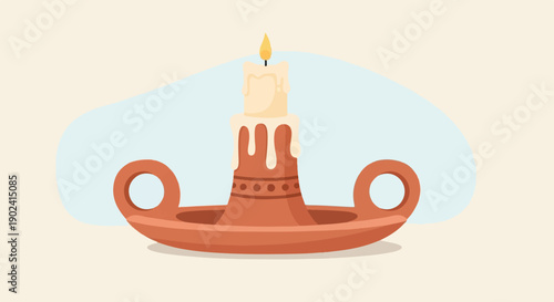 Rustic terracotta candle holder with a lit candle, soft light