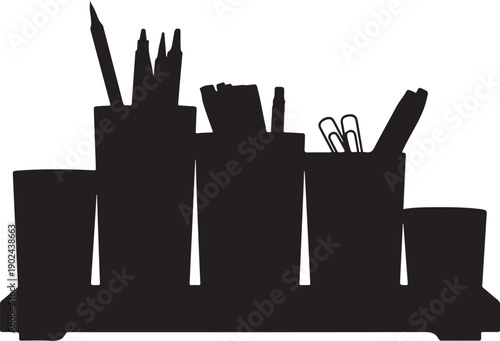 Black silhouette of desk organizer with pens and paperclips
