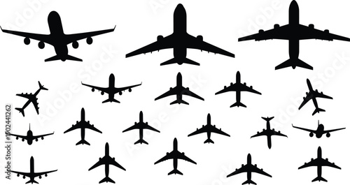 Black silhouettes of airplanes in various flying positions aircraft