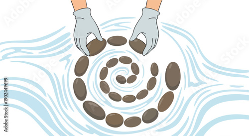 Hands arranging coffee beans in spiral pattern.