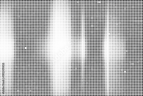 Blurry black and white pattern with vertical lines and dark spots