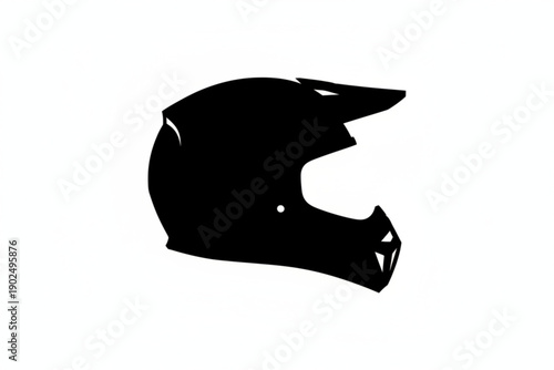 Silhouette of a Protective Helmet: A striking silhouette of a modern, rugged helmet, showcasing the robust design, angled visor and chin guard, symbolizing adventure and rider safety.