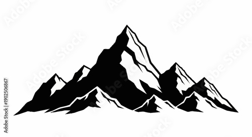 Majestic mountain range silhouette with snow capped peaks.
