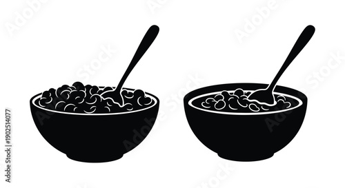 Two bowls of cereal with spoons presented in black silhouette