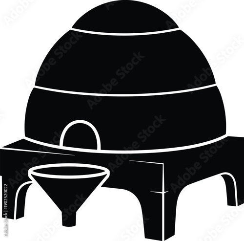 Black silhouette of a clay oven with a funnel on a table cooking