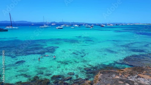 speed ramp island with many yachts and sailboats. Lovely aerial view drone