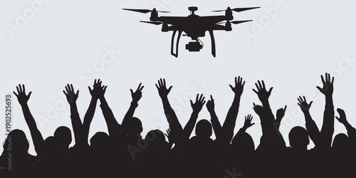 Silhouette of a crowd with hands raised towards a drone flying overhead, symbolizing technology and public interest.