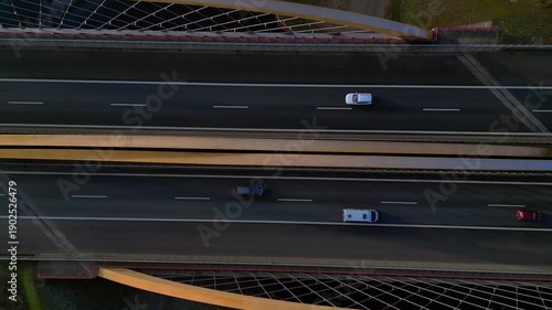speed ramp German autobahn bridge over river. Lovely aerial view drone