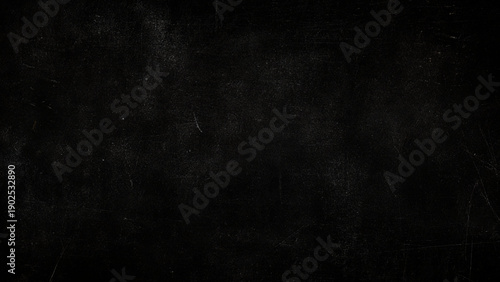 Scratched dark surface with scratches and marks