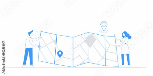 Two people examining a large unfolded map with location markers