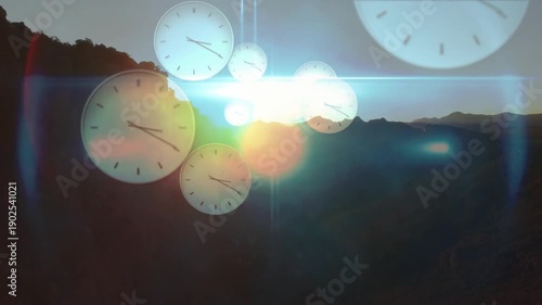 Sun emerging at horizon causing translucent clock faces growing, drifting, overlapping across ridge