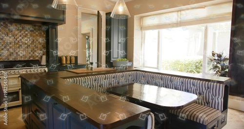 Foto Displaying U-shaped banquette seating wrapping dark wood table in home kitchen,
