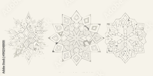 Intricate snowflake designs in grayscale arranged in a horizontal composition