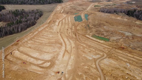 Construction sand mining at a large sand quarry, aerial view
