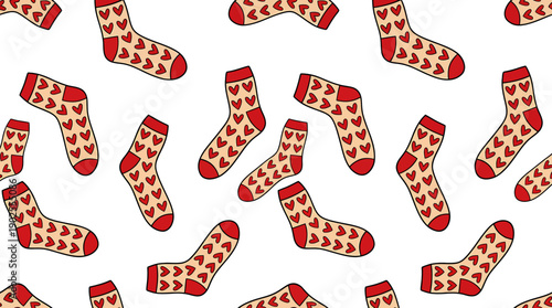 Heartpatterned socks scattered on white background for valentines day