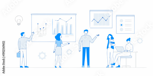 Business team collaborating with charts and data during a presentation