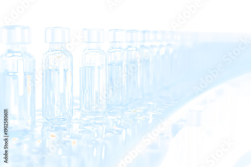 Row of Clean Glass Medical Vials in a Bright Laboratory Setting