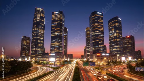 Wallpaper Mural Modern cityscape with skyscrapers and night traffic on a highway. Torontodigital.ca
