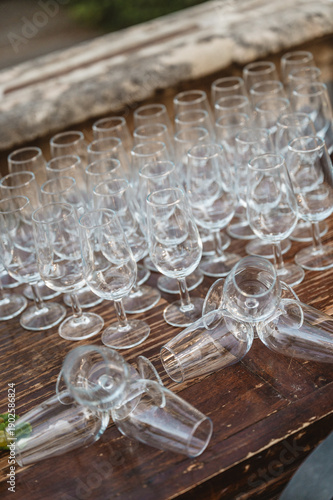 Fotografie Perfect collocation of glasses of wine over an old wood table.