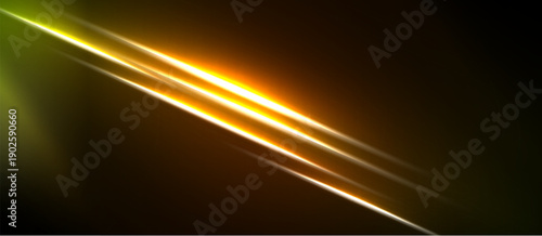 Abstract light streaks dominate dark background. Golden hues blend with green, creating dynamic visual effect. Brightness contrasts sharply.