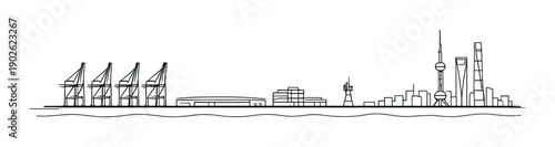 Silhouette of urban skyline with skyscrapers and cranes at night