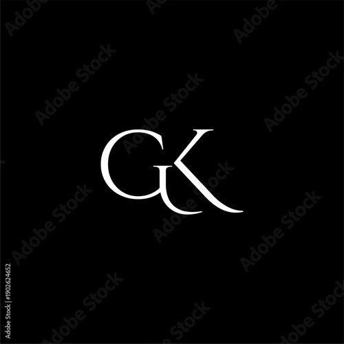 White GK Monogram Logo on Black Background.