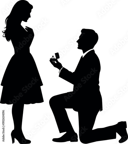 A silhouetted couple during a romantic marriage proposal moment