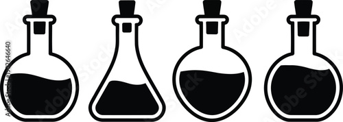Four different shaped black laboratory flasks with cork stoppers are partially filled with liquid