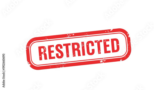 A red stamp with the word restricted