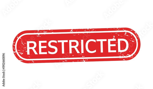 A red stamp with the word restricted on a for restricted or confidential concepts