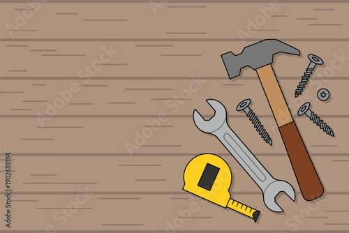 Flat Lay of Essential DIY and Repair Tools on a Wooden Background, do-it-yourself concept with copy space