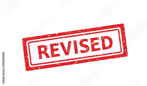 A red rubber stamp with the word revised on a for indicating document revisions