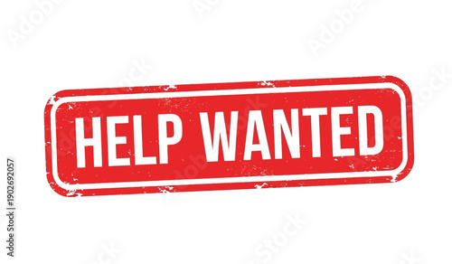 A red help wanted sign on a with a distressed texture