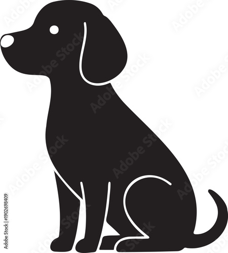 Black silhouette dog sitting calmly with floppy ears and tail