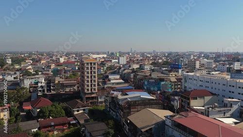 Wallpaper Mural Tripod aerial perspective of Vientiane, Laos, featuring Wat Ong Teu Mahawihan and buddhist temple architecture on a sunny day Torontodigital.ca