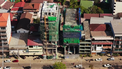 Wallpaper Mural Panoramic cityscape of Vientiane, showing Mekong River waterfront separating Laos and Thailand and urban development with morning sunlight Torontodigital.ca
