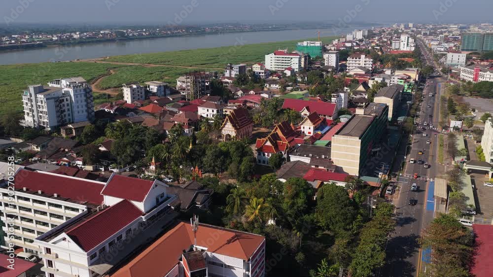 custom made wallpaper toronto digitalUrban landscape of Vientiane, Laos with its buddhist temples, traditional architecture, modern buildings and avenue with traffic
