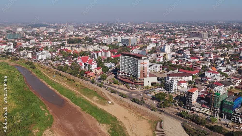 custom made wallpaper toronto digitalHigh altitude shot over green agricultural fields and the Mekong river, separating Laos from Thailand, with Vientiane in the background