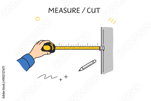 Hand measuring wall with tape measure and pencil