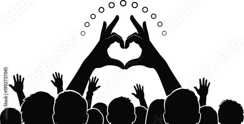Two hands forming a heart shape. Community, love, and unity with cheering crowd at a concert, party for  volunteering, support, and charity. 
