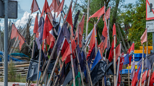 Close-up of weathered fishing marker flags