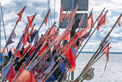 Collection of fishing flags by the sea