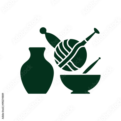 A graphic illustration of a vase, yarn, and knitting tools in dark green on a white background
