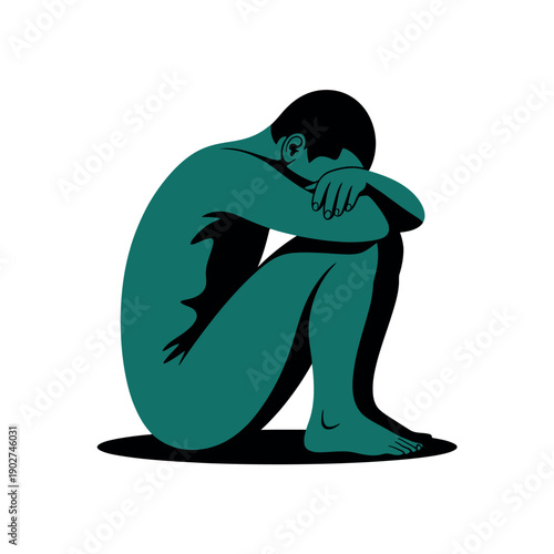 A man sits alone in a state of sadness and depression, overcome with emotion.