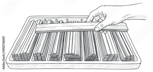 A hand arranging wooden sticks on a tray in a detailed black and white outline vector style, suitable for woodworking and craft projects