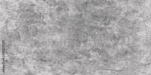 Abstract black and white grunge background featuring a dark aged texture of rough grey stone and vintage concrete wall surface